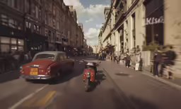 an old red motor bike passing through an old brick road
