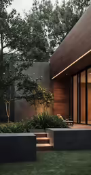 a very nice looking modern house with some plants in the yard