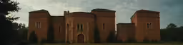 this is an old building with two clocks at the front of it