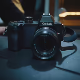 an old style camera sitting on a table
