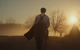 a man riding on top of a horse