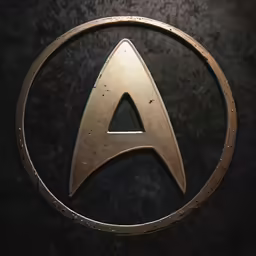 a star trek insignia is shown on a table