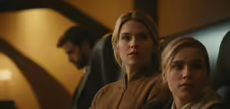 two women are sitting next to each other