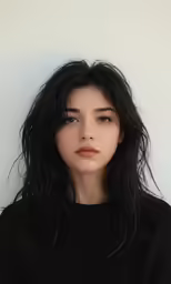 a woman standing with a long black hair