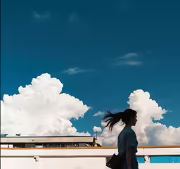 there is a woman that is walking alone