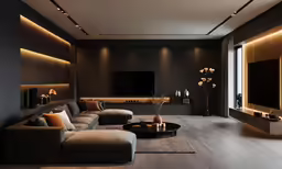 a room with large couches and a big screen tv