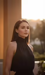 a beautiful woman wearing a black dress