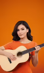 a woman posing with an acoustic guitar