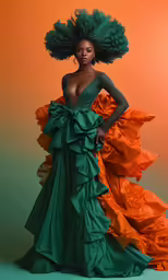 a woman with long hair and very tall gown