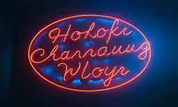 a neon sign with the words holoke shanaug woy