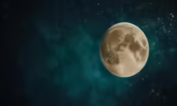 a full moon in the night sky as seen from an airplane