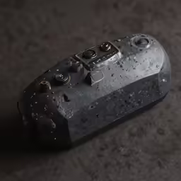the top of a black camera with holes in it