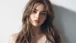 an attractive woman wearing a strapless bra top and long hair