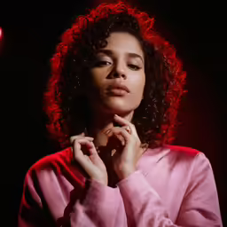 an image of a girl with curly hair