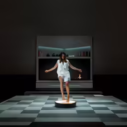 a woman is walking on a small platform