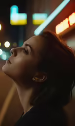 the woman is staring off in the distance