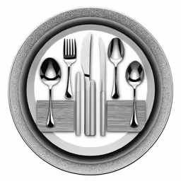 a white plate topped with silverware and utensils