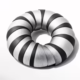 an in - between ring pillow sitting on top of a chair
