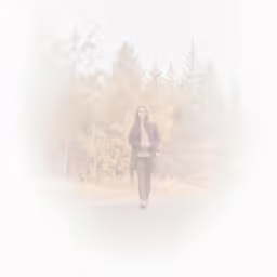 a woman walking down a street next to trees