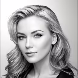 a woman with blonde hair and a black shirt