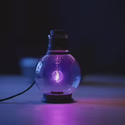 a light bulb with a blue glow shining in the water
