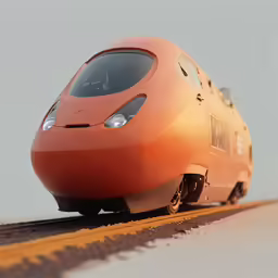 an orange modern train riding on the track