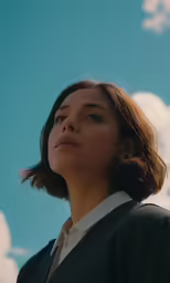 the woman in the picture is staring into the distance