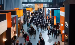 an overview photo of a crowded building with lots of people