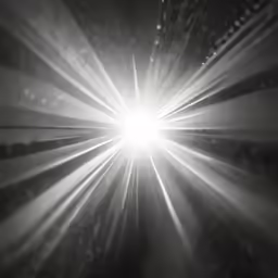 black and white photograph of rays in the dark