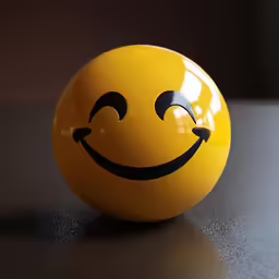 a yellow ball with a face painted on it