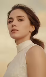 a woman is in the sky looking off into the distance