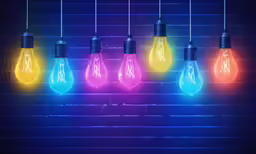 a colorful light bulb on a brick wall