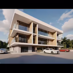 an apartment building with two balconies in front of it