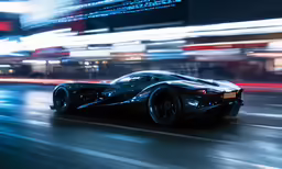 a car driving down a city street at night