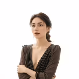 a young asian woman is posing for a photo