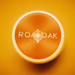 a yellow orange and white logo on a round object