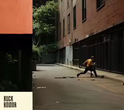 an image of two people running down the street