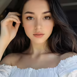 the beautiful woman has a half make - up and dark hair