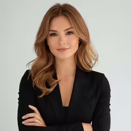 an image of a woman with her arms crossed