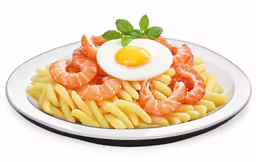a plate of pasta with shrimp, eggs, and ham