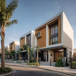 a four story building with palm trees in front