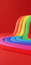 the back end of a table with colorful plastic chairs