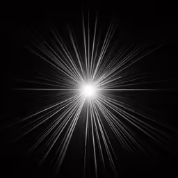 a light emitting out from a black background