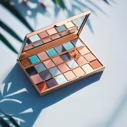 a palette of makeup sitting on top of a table