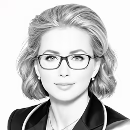 a woman with glasses wearing a stethoscope