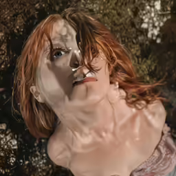 a woman with freckled hair and silver makeup is laying down