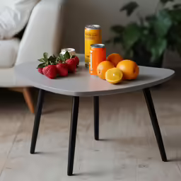 some food on top of a small coffee table