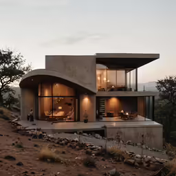 a very large house that looks incredible on top of a hill