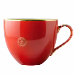 a red coffee cup with gold trimmings and a golden rim