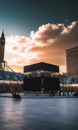 a large building with some people walking around it